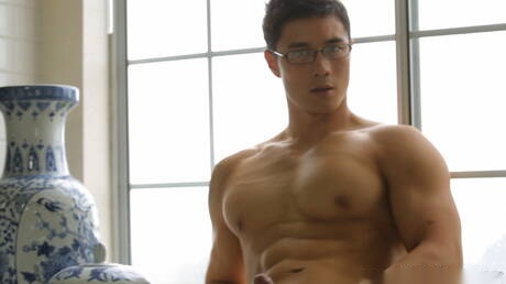 Asian bodybuilder Peter Le masturbating in bathroom