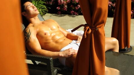 Asian bull Peter Le teasing his dick outside