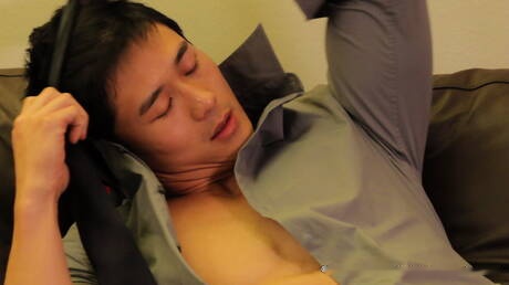 Asian bodybuilder Peter Le having a pleasure