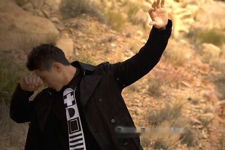 Oriental strong bull Peter Le take off his clothes outdoor