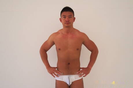 Oriental superstud Hiroshi undressing and showing nice butt