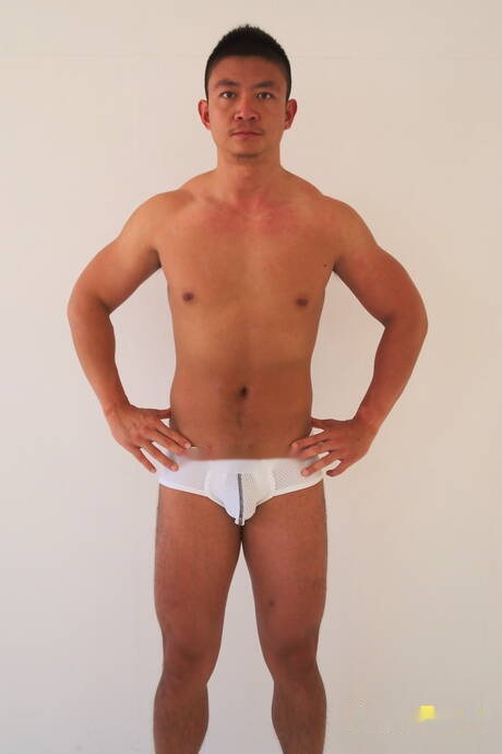 Oriental superstud Hiroshi undressing and showing nice butt