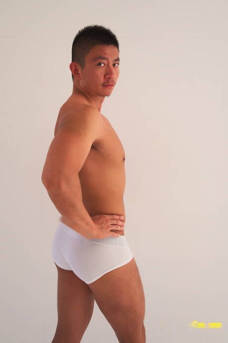 Oriental superstud Hiroshi undressing and showing nice butt