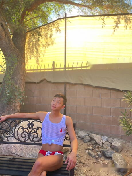 Oriental young dude Dane Jaxson masturbating with dildo at pool