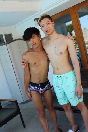 Oriental twink Kai Cho and young boy Matteo Gomez posing naked in the pool