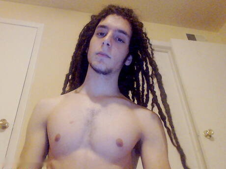 Husky guy Tarzan jerking with dildo