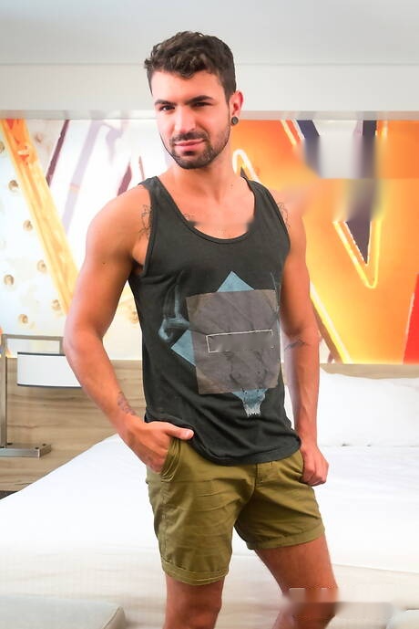 Latin beefcake Ian Greene posing naked and showing tight ass