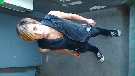 Beautiful boy Skyler undressing outdoor