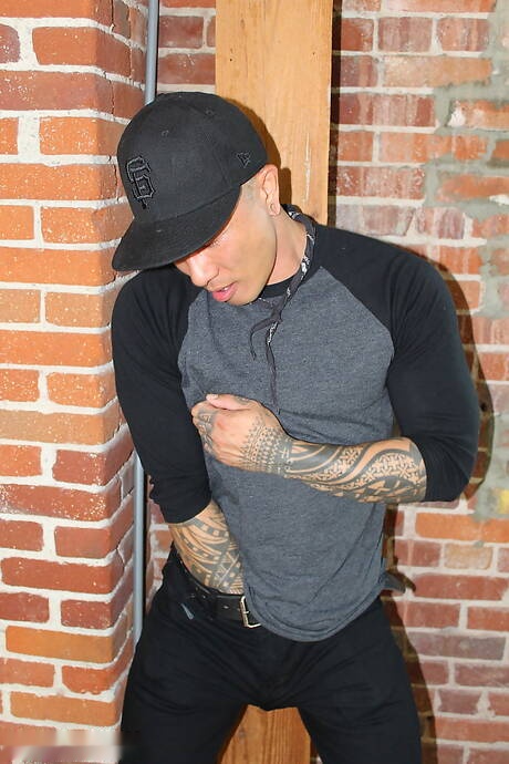 Oriental muscular Damian Dragon teasing his cock