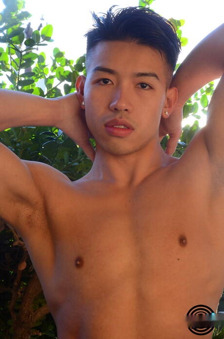 Strongman Dylan Nguyen and american muscular Zack Randall posing nude outside