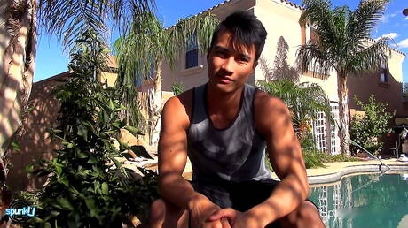 Oriental bull Ken Ott teasing his dick at the pool