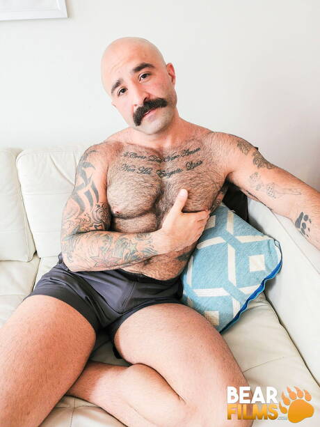 American hairy bear Atlas Grant teasing his cock