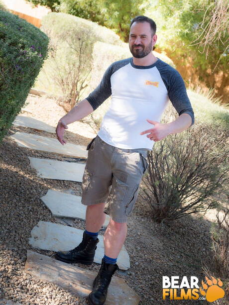 Bear Films: Muscular Butch Spencer undressing and showing hot butt outside