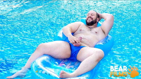 Swiss hot bear Adam Jones jerk off his cock at the pool