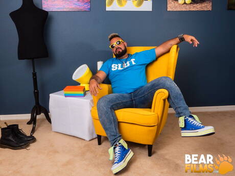 American bear Luis Vega undressing and showing tight ass