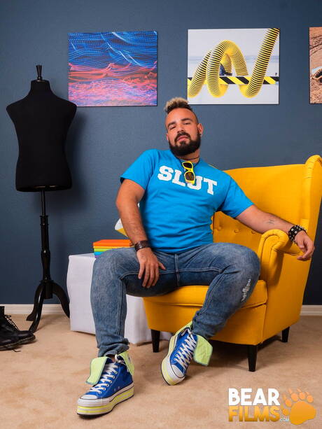 American bear Luis Vega undressing and showing tight ass