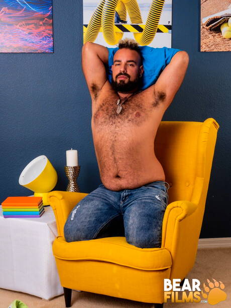 American bear Luis Vega undressing and showing tight ass