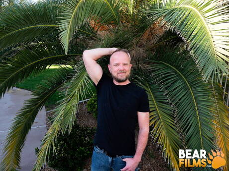 Bear Mitch Harrison undressing outside