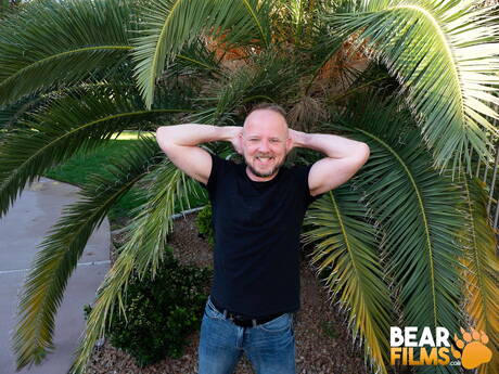 Bear Mitch Harrison undressing outside