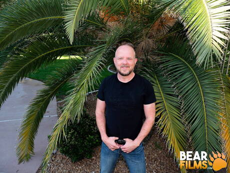 Bear Mitch Harrison undressing outside