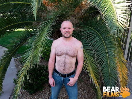 Bear Mitch Harrison undressing outside