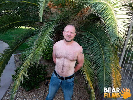 Bear Mitch Harrison undressing outside