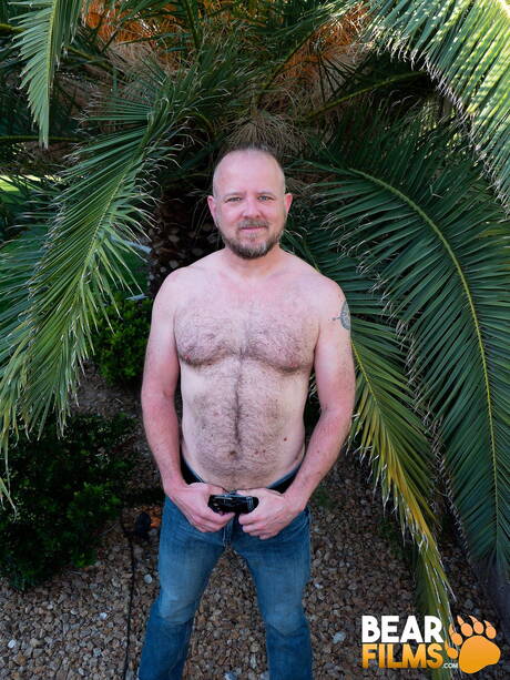 Bear Mitch Harrison undressing outside