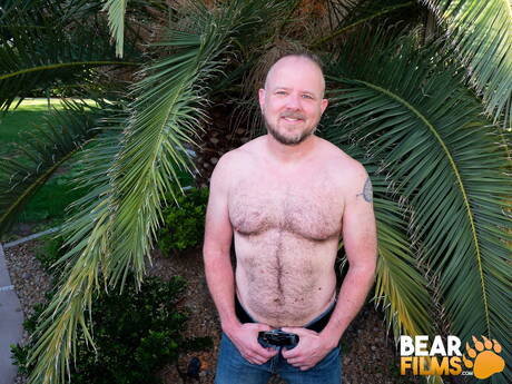 Bear Mitch Harrison undressing outside