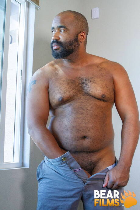 Black hot bear Emmett Frost take off his clothes