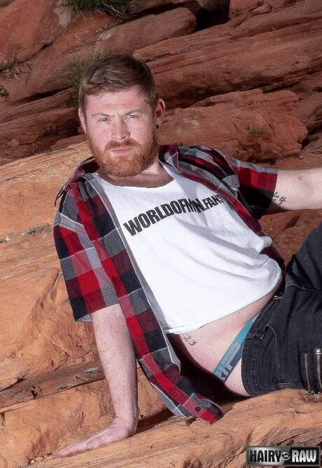 American otter Otto Samson stripping off outdoor