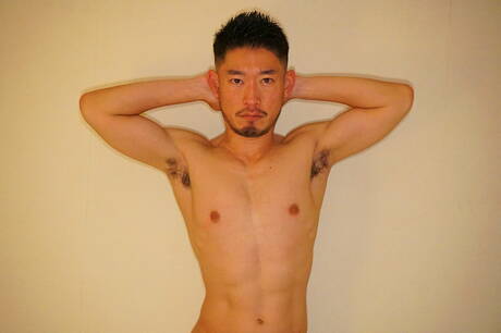 Oriental hunky guy Yu Yuki jerking with sex toy