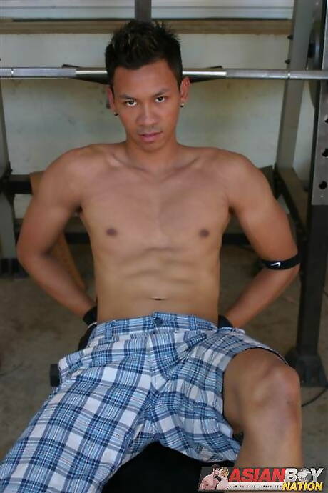 Asian beefcake Robbie Trinh playing with dick outdoor