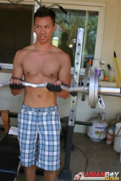 Asian beefcake Robbie Trinh playing with dick outdoor