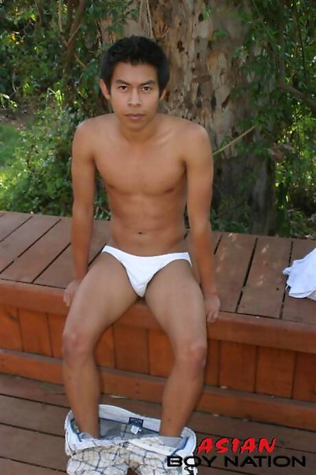 Oriental stud Pradit Flowers teasing his dick outside