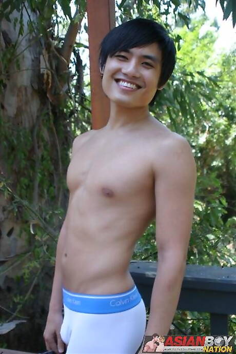 Oriental tough guy Peter Phanh playing with cock outside