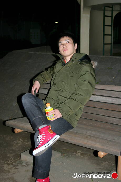 Oriental twink Toraemon teasing with toy outside