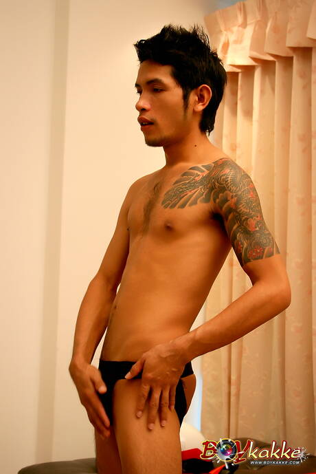 Oriental twink Jack Police jerk off his cock