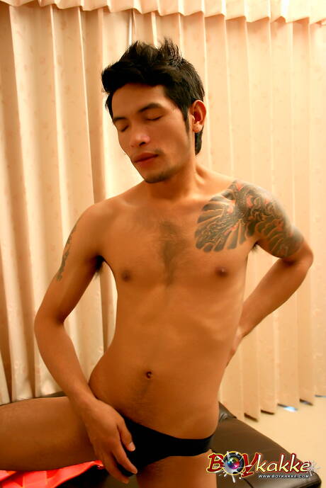 Oriental twink Jack Police jerk off his cock