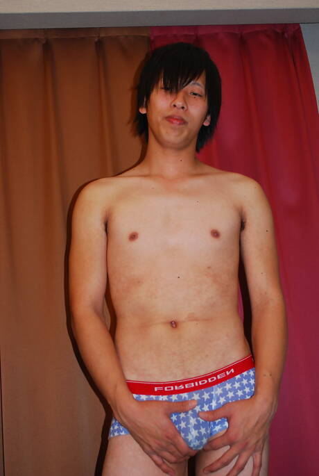 Asian young boy Ryo San shows a perfect body