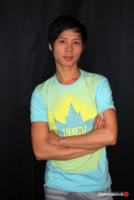 Oriental young boy Khan wanking in shower