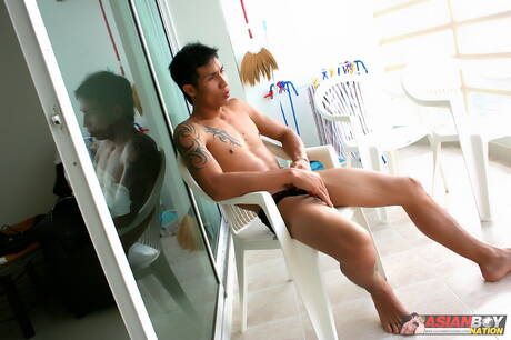 Oriental strongman Rock Keng masturbating