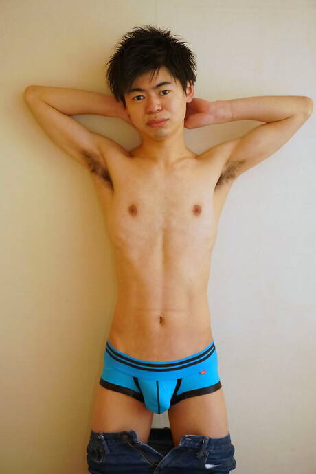 Asian young dude Tomoya teasing his cock in shower