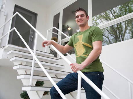 Bull Brenden Butler posing naked and showing his butt outside