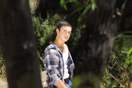 American beefcake Josh Conners teasing his dick outdoor