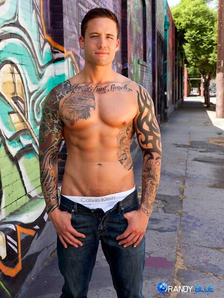 American stars husky guy Chris Bines and superstud Jordan Levine in cock sucking scene outside