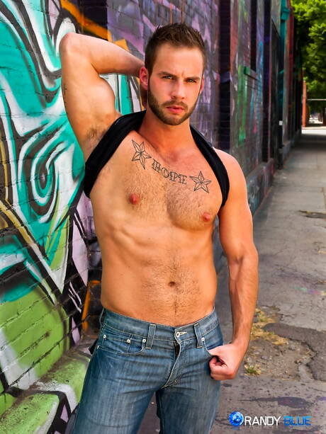 American stars husky guy Chris Bines and superstud Jordan Levine in cock sucking scene outside