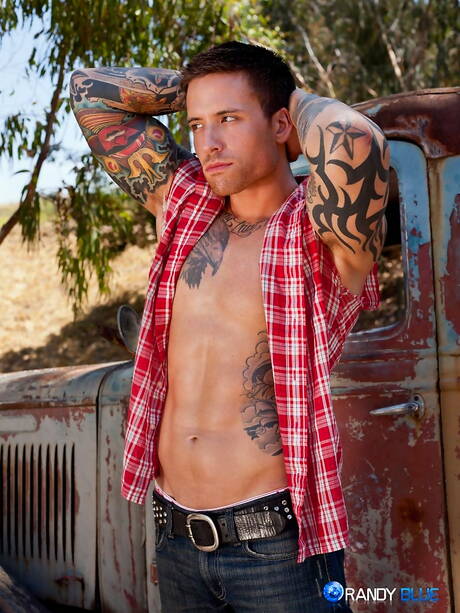 American beefcake Jordan Levine teasing his dick outside