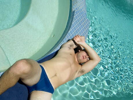 Well-built Taylor Banks teasing his dick outdoor