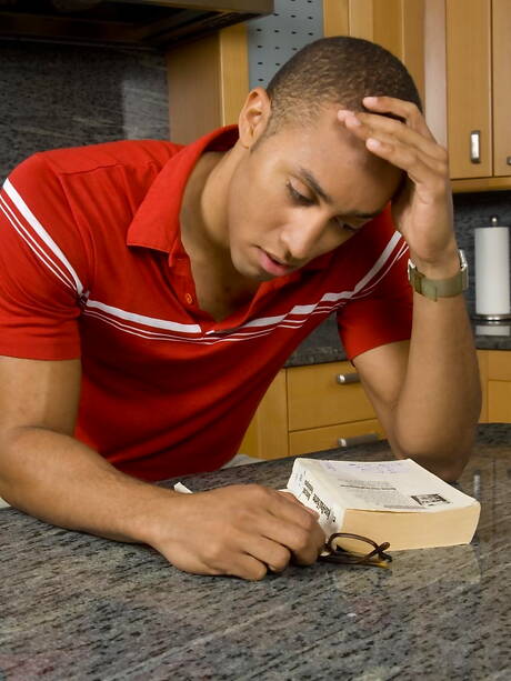 Ebony bodybuilder Tyler teasing his cock in kitchen