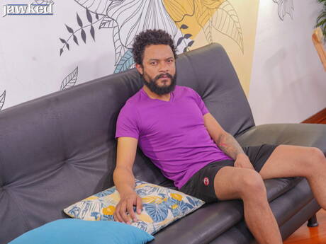 Ebony hunk Ego Red undressing and showing tight butt